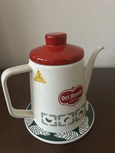 Kettle Delmonte with Hot Pad 2019 Gift-Hooped Enamel Used, Minor Scratches